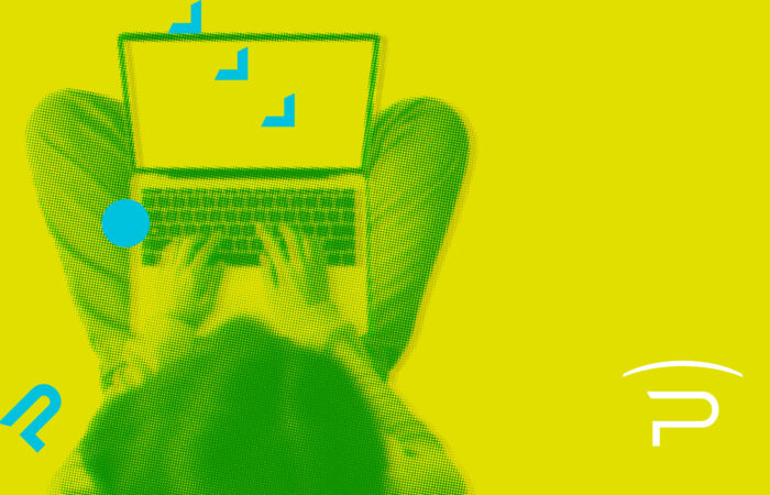 IT business analyst typing on a computer